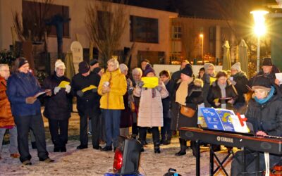 Weihnachtslieder singen  unter dem  Nussbaum